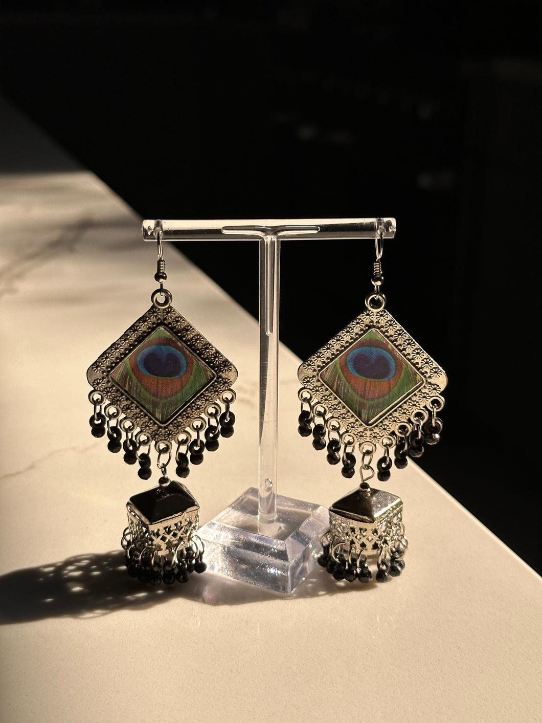 Long Silver Diamond Shaped Peacock Earrings